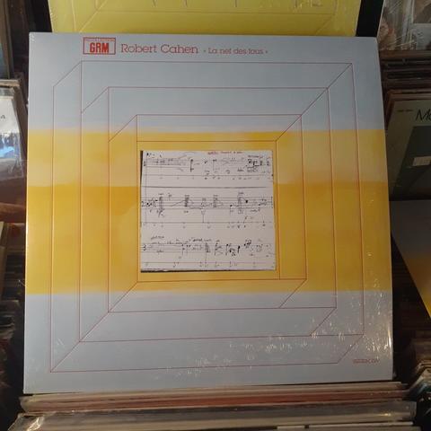 Album cover features indecipherable handwritten musical annotations.