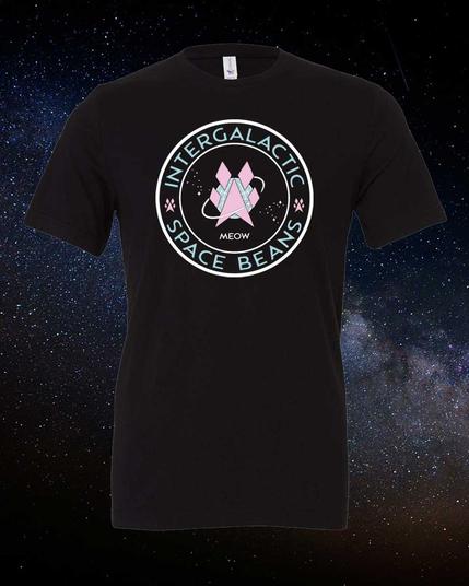 The Intergalactic Space Beans insignia - a circular logo with the words Intergalactic (top) Space Beans (bottom). A pink angular paw print in the middle against a field of white stars., encircled by a shooting star. The word MEOW where the date would be the silly human Space Force logo. 

Seen here on a black tee, but many color options are available