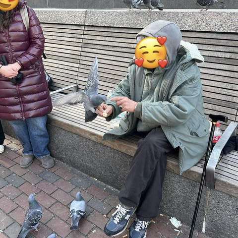 Ray “The Bird Man” with his pigeons.