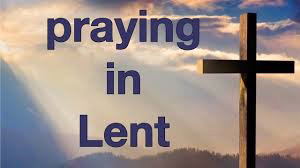 A cross on a hill against a cloudy background, with the words "praying in Lent"