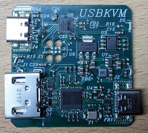 A 4×4cm green circuit board. On the left edge, there's a USB-C and a HDMI connector. On the right edge is another USB-C connector.

The main components on the board are
 - STM32F042 connected to the left USB connector
 - MS2109 (with the marking lasered off)