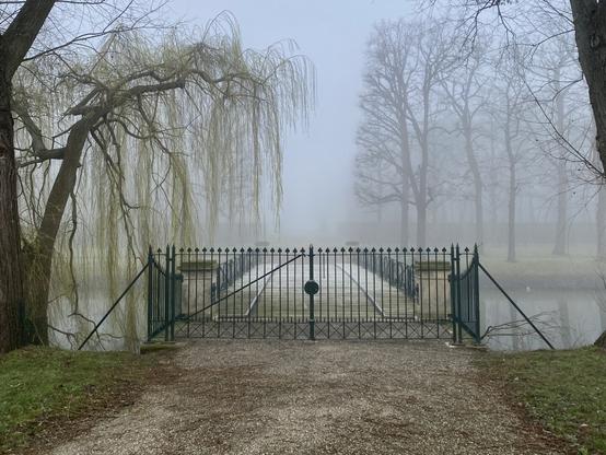 A gated bridge leading into the Große Garten, a part of the Herrenhausen Gardens.