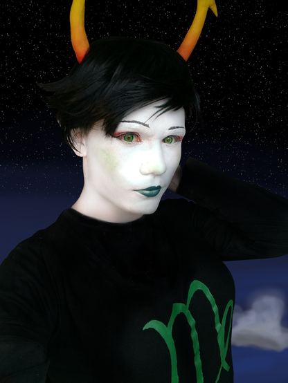 A cosplay picture of the character Kanaya Maryam from Homestuck.
