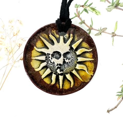 Ceramic sun pendant by surlyramics in bronze