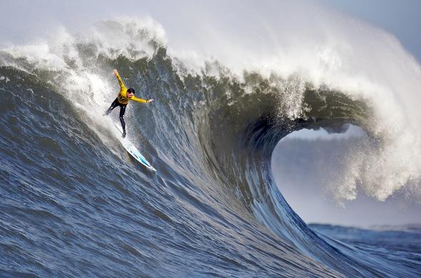 photo - surfer on a large wave