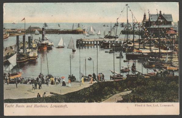 Printed colour postcard showing an animated view of the Yacht Basin and Harbour at Lowestoft in Suffolk.
Published by Flood & Son Ltd, Lowestoft, not numbered.
Postally used on 13 June 1905 with thimble Lowestoft postmark, stamp removed.
Good condition, with slight corner bumps, but stamp removed.
