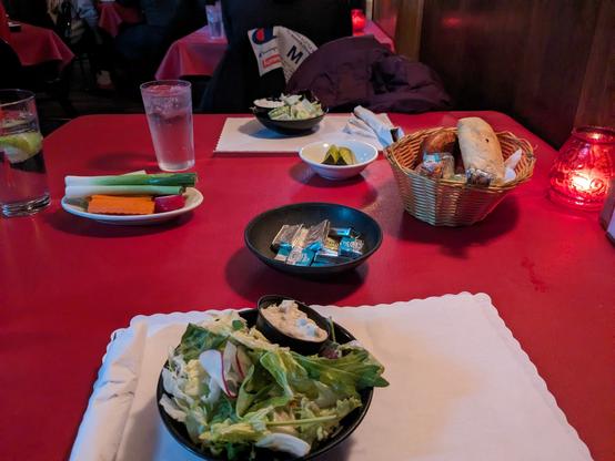 Salad, bread bowl, and relish tray