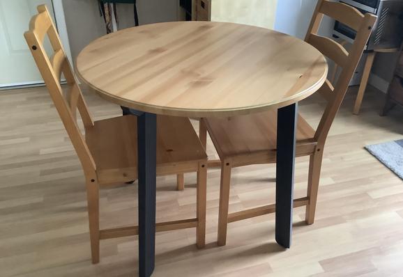 My kitchen table (small, round, wooden IKEA table).