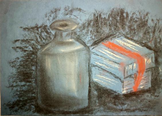 A drawing of a bottle and a box. The box is bound with a red ribbon. The negative space around the objects is drawn in grainy charcoal. The box is drawn crudely. The bottle appears glossy, because the pastels and charcoal have been smeared with fingers and the box is visibly reflected in the bottle.