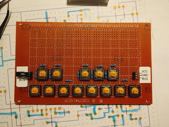 the previously finished key part spanning one octave. it can be chained to more boards like this to create a larger range. it only consists of buttons, resistors, and pin headers