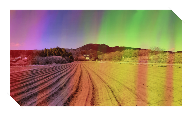 Shot contains a plowed field in the foreground and mountains and trees and such in the background. To spice things up I've added a rainbow colored filter.