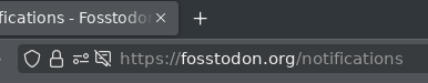 Default Firefox 123 URL bar. Most of the URL is barely readable gray on slightly darker gray.