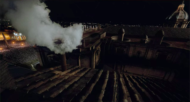 The chimney over the Vatican emitting white smoke to indicate a new pope has been selected.