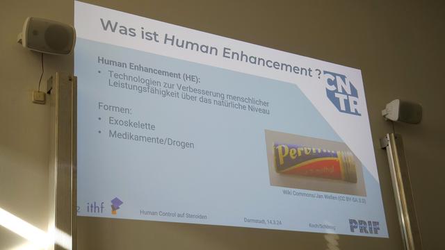 Präsentation zu Human Enhancement von Prof. Dr. Bernhard Koch (ITFH) und Dr. Niklas Schörnig (PRIF).