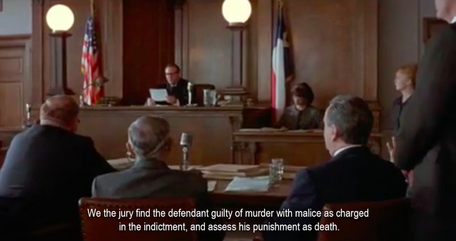 A judge in a courtroom with a Texas flag reads from a piece of paper. “We the jury find the defendant guilty of murder with malice as charged in the indictment, and assess his punishment as death.”