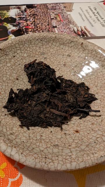 Dry aged raw puerh cake.