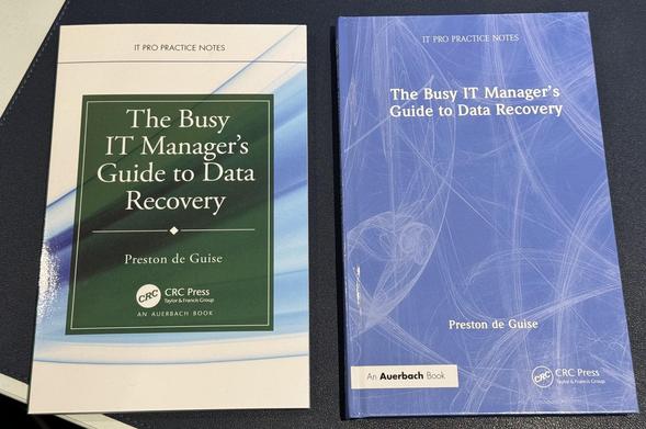 Two books, side by side. Paperback is on the left, hard-cover is on the right. Both books are “The Busy IT Manager’s Guide to Data Recovery”, by Preston de Guise.