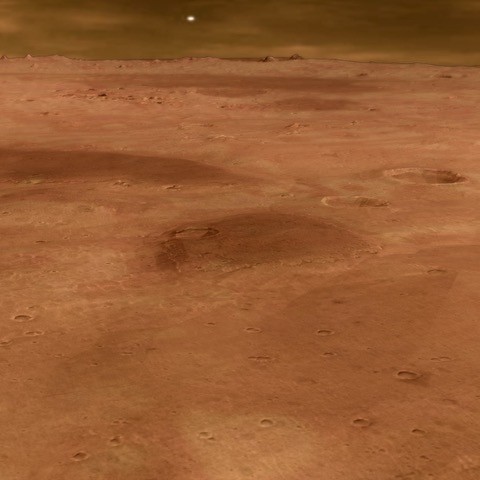 A view of Oxia Planum region on mars, very flat, craters, red tones.