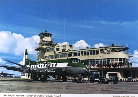 Plane waits at the terminal underblue skies