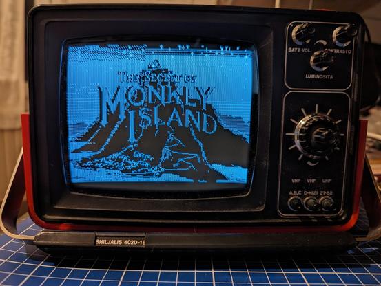Shiljalis portable tv, front view, showing the title screen of "The Secret of Monkey Island", CGA B/W version