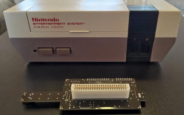 The back side of the NES hub next to the PAL NES.