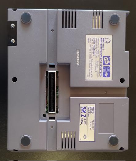 The underside of the NES, showing the expansion port (cover removed).