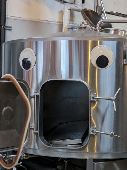 googly eyes on a brewing vat