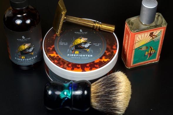 An MM24 propped up on a tub of NO Firefighter soap surrounded by a matching splash, IA Sundrunk frag and a Dogclaration B3 brush