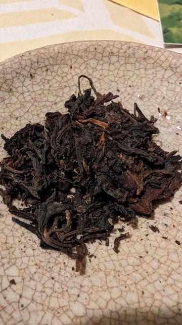 Dry raw puerh leaves.