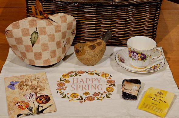 A rustic tea tableau of birds & baskets, with Garden Party oolong tea.