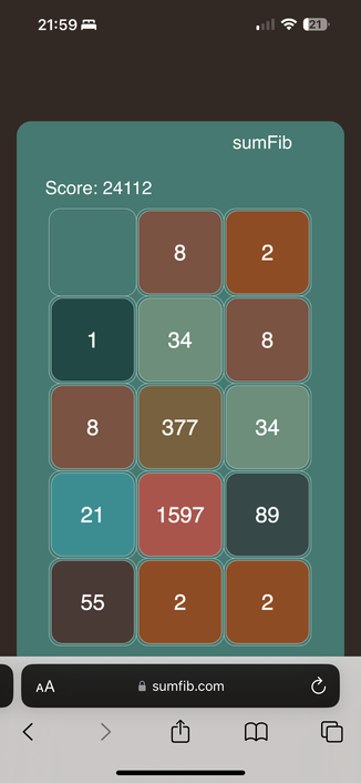 screenshot of game on phone with 1597 being the highest tile. the time of 21:59 is at the top with the web address of sumfib.com shown below. 

Tiles are multiple colors depending on the value. all but one space is full.