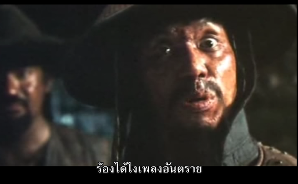 Subtitles on a movie... unclear what language LOL...