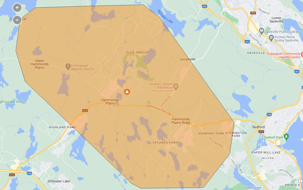 Nova Scotia Power Outage Map, showing a large orange-brown section that has no power. It's very close to me, but I still have power... I hope I don't lose it. All Hammonds Plains Road to Glen Arbour and Upper Hammonds Plains.. so far is out