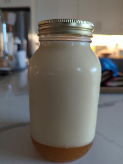 Large mason jar filled with homemade beef tallow