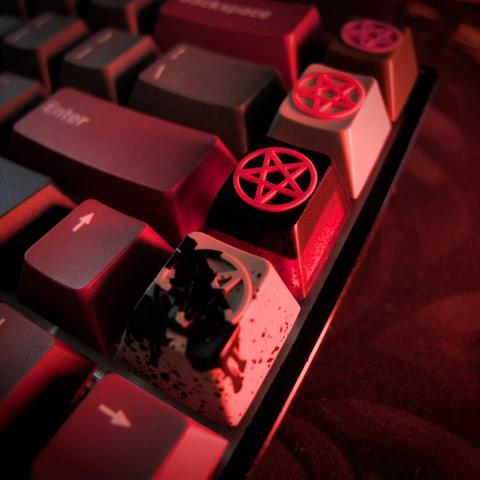 photograph of some artisan keycaps on a mechanical keyboard