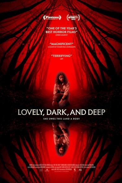 film poster for Lovely, Dark and Deep, showing a red background, skeletal trees surrounding a kneeling woman, the image mirrored as if in a lake