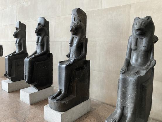 Four statues of the Goddess Sakhmet, a cat-headed feminine figure, from the Metropolitan Museum of Art.