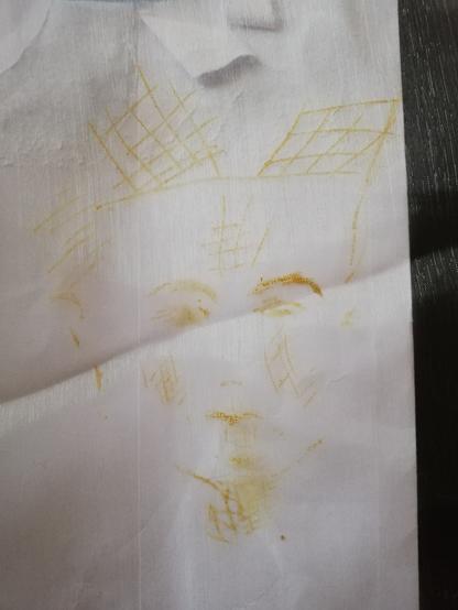 Sketch of the head of Nefertiti, done mainly using hatching for shadows in gold marker pen on gauze.