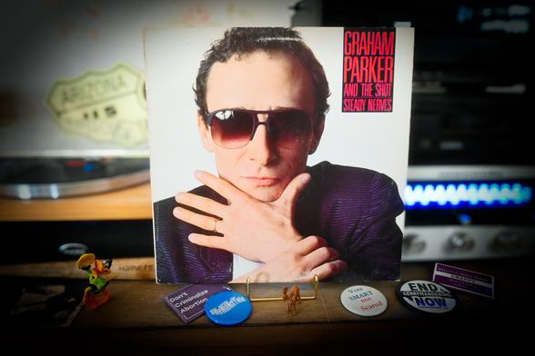 "Steady Nerves" by Graham Parker and the Shot, released in March 1985.