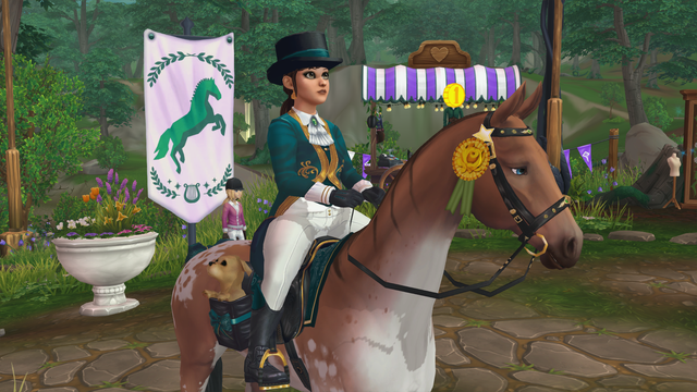 A girl in a teal, gold and white dressage outfit and top hat on a brown and white horse at the Valedale Championship hub in the video game, Star Stable Online. A white banner with a green horse and filigree in the background. Note the Gold and green ribbon on the horse's bridle representing 1st place.
