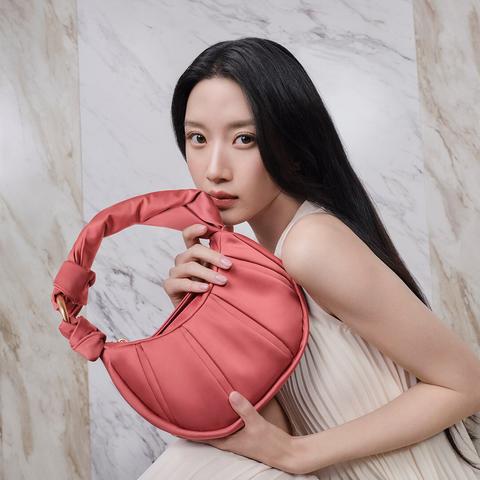 Moon Ga-young and Tumi Asra handbag, photographed by Bibi Cornejo Borthwick, directed by C. Prinz.