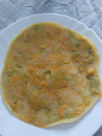 Barbotla. Ricetta della lunigiana con fiori di zucca, farina e acqua. Cotta in forno.