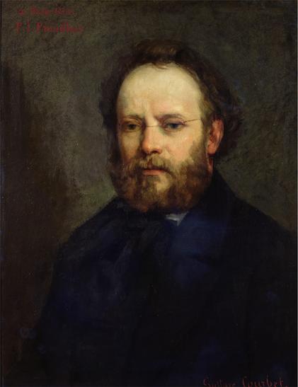 Portrait of Proudhon by Gustave Courbet, 1865, with wavy brown hair, beard & mustache. By Gustave Courbet - 1. FineArtPrintsOnDemand.com2. The Bridgeman Art Library, Object 88479, Public Domain, https://commons.wikimedia.org/w/index.php?curid=6635978