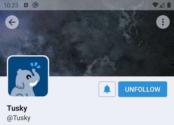 The @Tusky profile header as seen from Tusky, this time the statusbar and the buttons are dark on light, but the buttons are more opaque and the statusbar more transparent than before