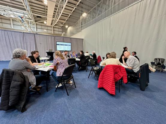 Workshop participants listening to each other share