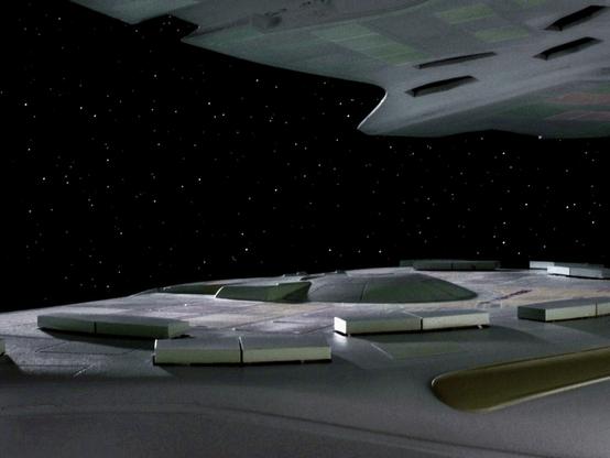 Screencap of the Enteprise-D battle bridge area showing the edge of the phaser array