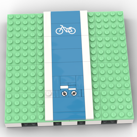A 16-by-16 Lego mils plate, topped with 4-by-4 medium green plates. Running from front to back up the middle of the plate is a 4-stud-wide dark azure tiled cycle lane, flanked by 1-stud-wide tiled white lines. Near the beginning of the cycle lane is a brick built bike symbol in white, with two circles (the ends of Technic pins) representing the wheels, a half-plate-wide, 1-stud-long stripe representing the seat, and a 1-plate-wide, 1-stud-long stripe representing the handlebars (and basket!). Further back is a bike symbol printed on a 2-by-4 LEGO tile.