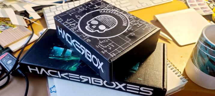 Every other box we've received has the dimensions of the one on top. The one on the bottom is the one received today - much shorter, much longer, slightly narrower. Unique art of a hoodie wearing hacker with their back towards us looking at a screen.
