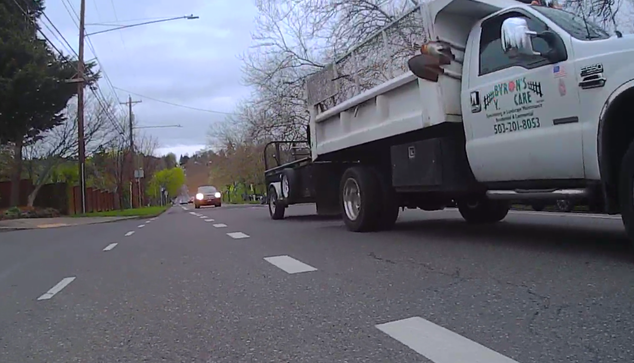F550 from Byron's Y Care (did someone peel off the ARD stickers?), stinking up a hill with a trailer full of stinky noisemakers, going to get paid probably barely enough to cover any of this trash even with the subsidies of free driving and parking