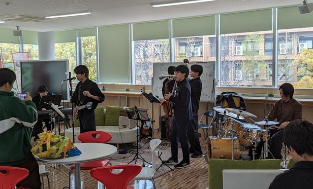 A group of students playing Jazz on a Japanese campus.